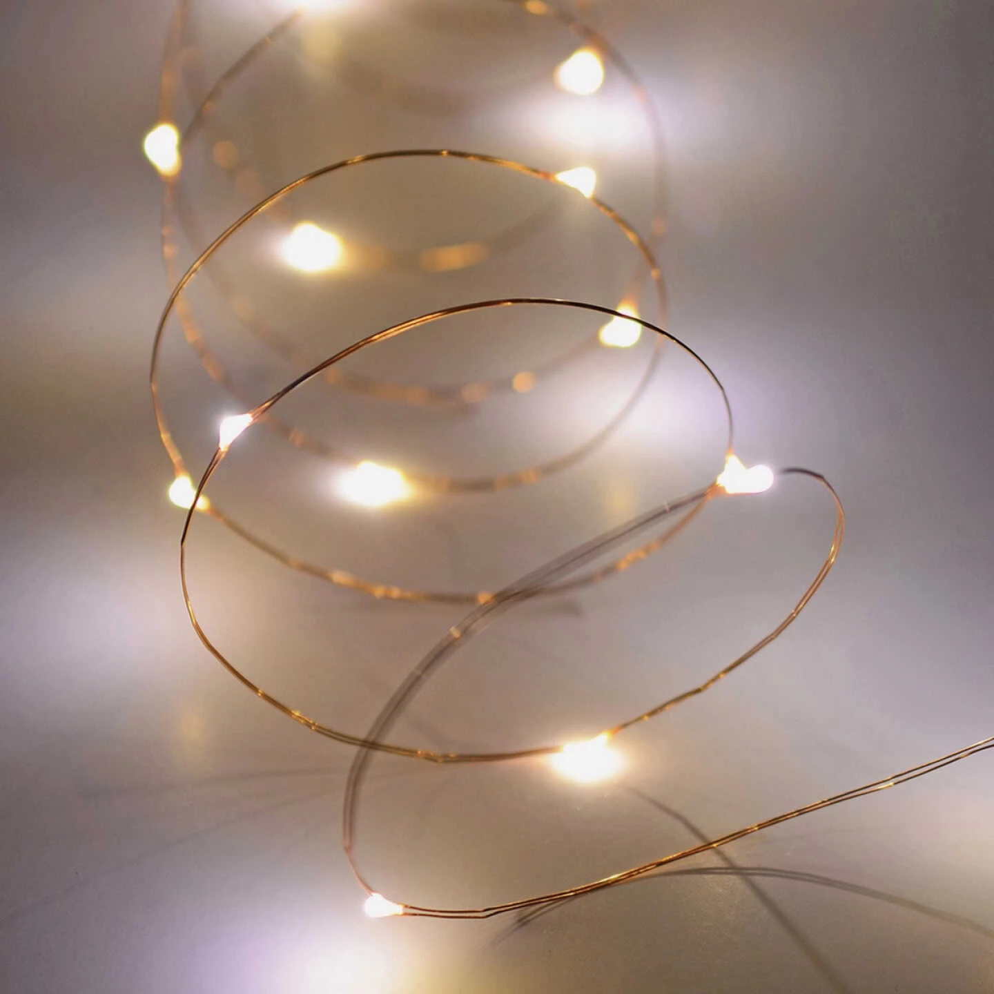Alpine 10-1/2 Ft. 60-Light Warm White LED Battery Operated Copper String Light Set 6 Alpine 10-1/2 Ft. 60-Light Warm White LED Battery Operated Copper String Light Set - Image 4